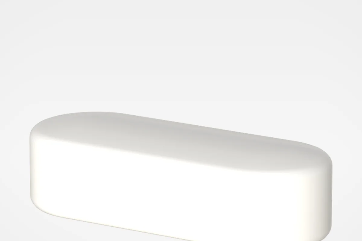 Fehér filmtabletták világosszürke porcelánon